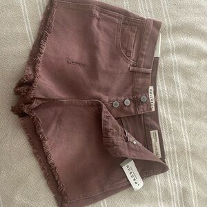 Dusty Rose colored high rise button up shorts